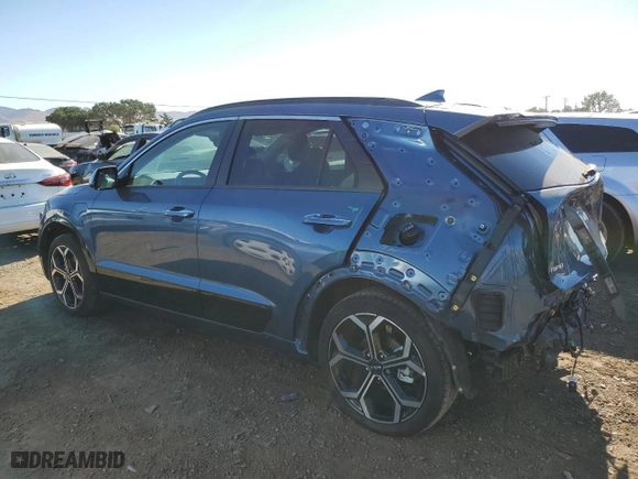 2023 Kia Niro Plug-In Hybrid SX Touring with VIN KNDCR3LF7P5069155, listed as a Copart auction lot 76610104 with 16,271 mi miles and Salvage Title. Bid and sale history available at carsss.com. Image 2.