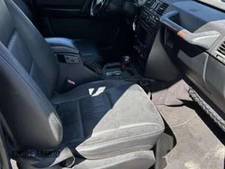 2003 Mercedes-Benz G-Class with VIN WDCYR49E33X141312, listed as a Copart auction lot 50188485 with 146,986 mi miles and Salvage Title. Bid and sale history available at carsss.com. Image 5.
