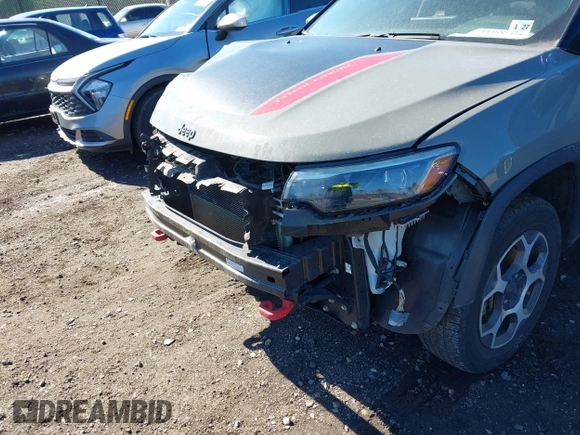 2022 Jeep Compass Trailhawk with VIN 3C4NJDDB4NT136213, listed as a IAAI auction lot 41689612 with 50,091 mi miles and . Bid and sale history available at DreamBid. Image 18.