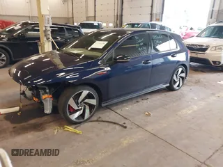 2022 Volkswagen Golf GTI S with VIN WVWG87CD5NW178683, listed as a IAAI auction lot 41711208 with 57,901 mi miles. Bid and sale history available at carsss.com. Image 2.