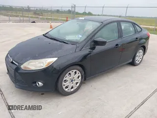 2012 Ford Focus SE with VIN 1FAHP3F21CL372769, listed as a IAAI auction lot 42107424 with 202,142 mi miles. Bid and sale history available at carsss.com. Image 2.
