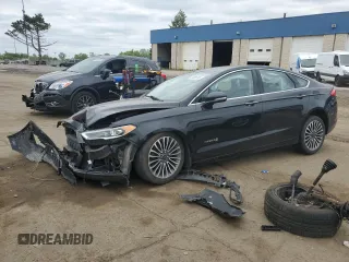 2017 Ford Fusion Hybrid Titanium with VIN 3FA6P0RU0HR216363, listed as a Copart auction lot 57639745 with 132,569 mi miles and Clean title. Bid and sale history available at DreamBid. Image 1.