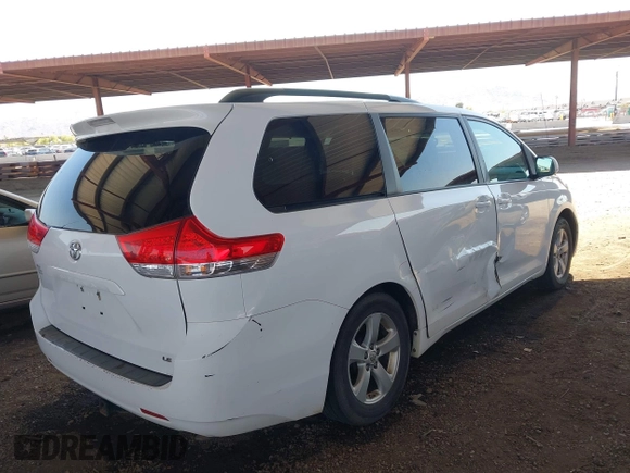 2012 Toyota Sienna LE AAS with VIN 5TDKK3DC4CS274117, listed as a IAAI auction lot 42008690 with 205,353 mi miles. Bid and sale history available at carsss.com. Image 4.
