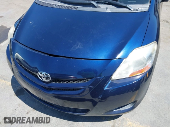 2008 Toyota Yaris with VIN JTDBT923881276508, listed as a IAAI auction lot 42001178 with 165,579 mi miles. Bid and sale history available at carsss.com. Image 6.