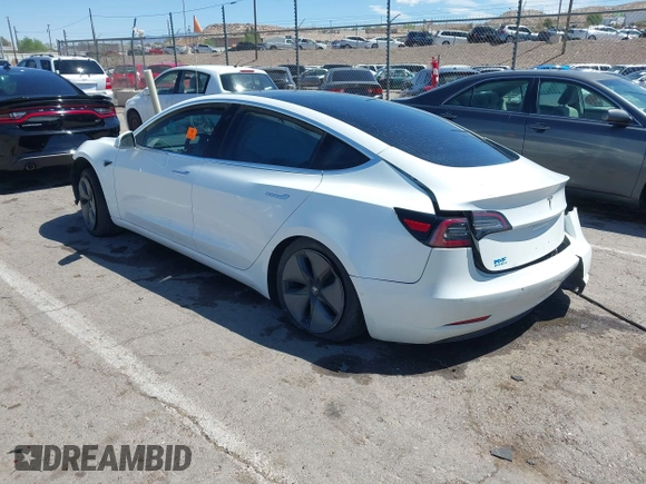 2018 Tesla Model 3 Long Range Battery with VIN 5YJ3E1EA3JF057527, listed as a IAAI auction lot 42072126 with 1 mi miles. Bid and sale history available at carsss.com. Image 3.