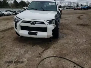 2023 Toyota 4Runner SR5 with VIN JTEEU5JR7P5297006, listed as a Copart auction lot 53828885 with 34,777 mi miles and Salvage title. Bid and sale history available at DreamBid. Image 13.
