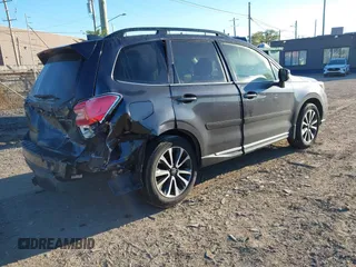 2017 Subaru Forester Touring with VIN JF2SJGTC3HH516646, listed as a IAAI auction lot 40560446 with 85,842 mi miles. Bid and sale history available at carsss.com. Image 4.