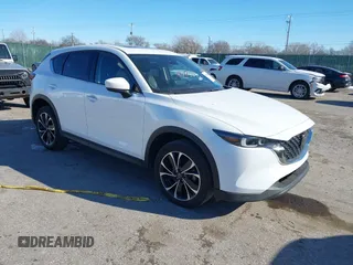 2022 Mazda CX-5 2.5 S Premium Package with VIN JM3KFBDM2N0637373, listed as a IAAI auction lot 41382688 with 101,350 mi miles. Bid and sale history available at carsss.com. Image 1.