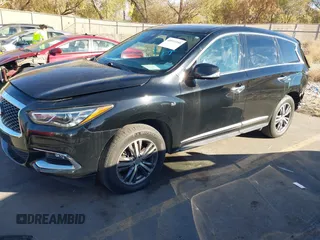 2020 Infiniti QX60 Luxe with VIN 5N1DL0MM5LC522210, listed as a IAAI auction lot 40913550 with 90,289 mi miles and . Bid and sale history available at DreamBid. Image 2.