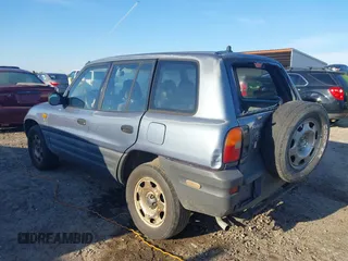 1997 Toyota RAV4 with VIN JT3GP10VXV0015872, listed as a IAAI auction lot 41827830 with 314,640 mi miles and . Bid and sale history available at DreamBid. Image 3.