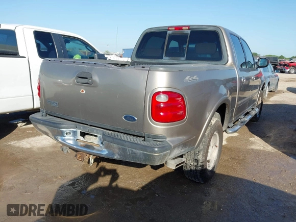 2003 Ford F-150 XLT with VIN 1FTRW08L23KD29957, listed as a IAAI auction lot 41896874 with 1 mi miles. Bid and sale history available at carsss.com. Image 4.
