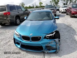 2018 BMW M2 z VIN WBS1J5C53JVD36649, wystawiony jako Copart lot #57961455 z przebiegiem 55 751 mil mil oraz Szkoda całkowita • Salvage title. Historia ofert i sprzedaży dostępna na DreamBid. Obrazek 13.