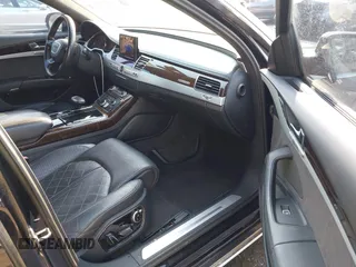 2011 Audi A8 with VIN WAUAVAFD6BN023937, listed as a IAAI auction lot 41288464 with 158,127 mi miles and . Bid and sale history available at DreamBid. Image 5.