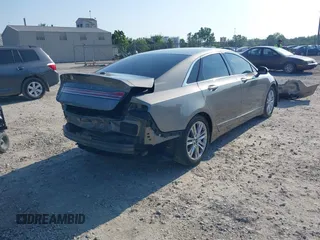 2016 Lincoln MKZ z VIN 3LN6L2G96GR601677, wystawiony jako IAAI lot #42647759 z przebiegiem 87 283 mil mil oraz . Historia ofert i sprzedaży dostępna na DreamBid. Obrazek 4.