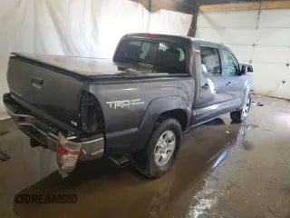 2013 Toyota Tacoma z VIN 5TFLU4ENXDX061110, wystawiony jako Copart lot #58910865 z przebiegiem Nie podano mil oraz Szkoda całkowita • Salvage title. Historia ofert i sprzedaży dostępna na DreamBid. Obrazek 3.
