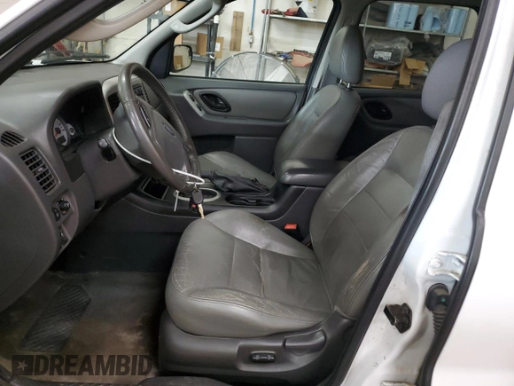 2006 Ford Escape XLT with VIN 1FMCU03106KC14923, listed as a Copart auction lot 52727095 with 126,842 mi miles and Salvage Title. Bid and sale history available at DreamBid. Image 7.