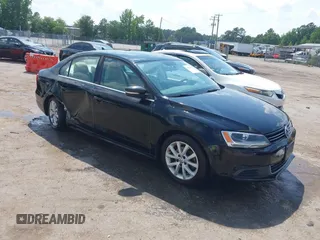 2014 Volkswagen Jetta SE z VIN 3VWD17AJ6EM386018, wystawiony jako IAAI lot #42615922 z przebiegiem 110 343 mil mil oraz . Historia ofert i sprzedaży dostępna na DreamBid. Obrazek 1.