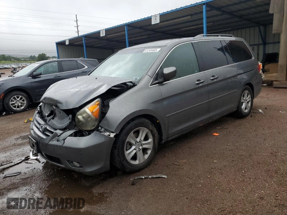 2010 Honda Odyssey Touring с VIN 5FNRL3H92AB114278, выставлен на аукционе Copart как лот 61245465 с пробегом 186 733 миль миль и Чистый • Clean title. История ставок и продаж доступна на DreamBid. Изображение 1.