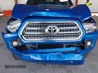 2017 Toyota Tacoma SR5 with VIN 3TMBZ5DN1HM009204, listed as a IAAI auction lot 41301765 with 129,923 mi miles and . Bid and sale history available at DreamBid. Image 6.
