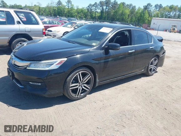 2016 Honda Accord Touring with VIN 1HGCR3F93GA036152, listed as a IAAI auction lot 42134354 with 233,311 mi miles and . Bid and sale history available at DreamBid. Image 17.