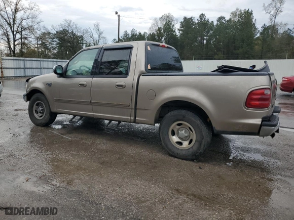 2002 Ford F-150 XLT with VIN 1FTRW07672KA18146, listed as a Copart auction lot 86645694 with 296,886 mi miles and Salvage Title. Bid and sale history available at carsss.com. Image 2.