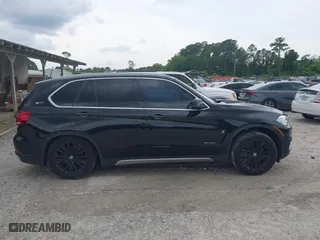 2017 BMW X5 xDrive40e iPerformance with VIN 5UXKT0C30H0V95867, listed as a IAAI auction lot 42122827 with 84,271 mi miles. Bid and sale history available at carsss.com. Image 13.