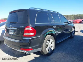 2012 Mercedes-Benz GL-Class GL 450 with VIN 4JGBF7BE2CA795653, listed as a IAAI auction lot 41847301 with 144,137 mi miles. Bid and sale history available at carsss.com. Image 4.