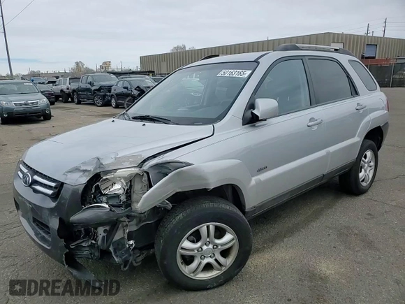 2005 Kia Sportage LX with VIN KNDJE723457117231, listed as a Copart auction lot 50163165 with 97,273 mi miles and Salvage Title. Bid and sale history available at carsss.com. Image 12.