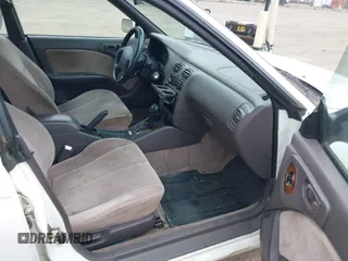 1996 Subaru Legacy with VIN 4S3BD4559T7202906, listed as a IAAI auction lot 42214410 with 211,118 mi miles and . Bid and sale history available at DreamBid. Image 5.