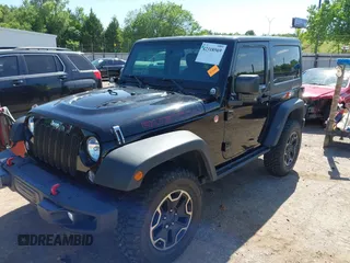 2015 Jeep Wrangler Rubicon Hard Rock with VIN 1C4BJWCG1FL610028, listed as a IAAI auction lot 42318569 with 48,627 mi miles and . Bid and sale history available at DreamBid. Image 17.