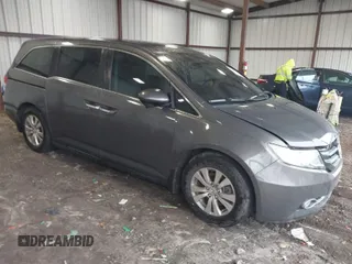 2014 Honda Odyssey EX-L with VIN 5FNRL5H6XEB060090, listed as a IAAI auction lot 41625571 with 112,762 mi miles and . Bid and sale history available at carsss.com. Image 1.