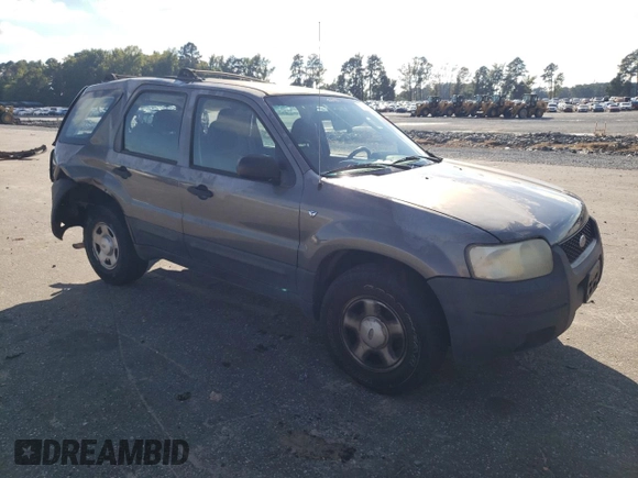 2004 Ford Escape XLS with VIN 1FMYU92134KA21707, listed as a Copart auction lot 72114804 with 219,518 mi miles and Salvage Title. Bid and sale history available at DreamBid. Image 4.