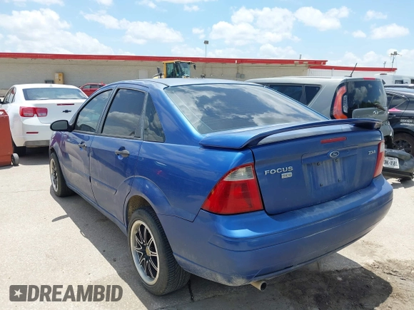 2005 Ford Focus S with VIN 1FAFP34N65W158687, listed as a IAAI auction lot 42706418 with Not provided miles and . Bid and sale history available at DreamBid. Image 3.