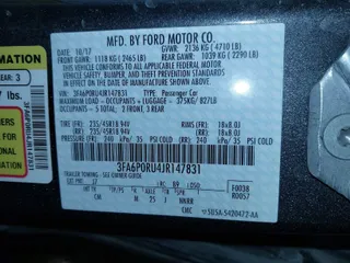 2018 Ford Fusion Hybrid Titanium with VIN 3FA6P0RU4JR147831, listed as a IAAI auction lot 41586033 with 101,088 mi miles. Bid and sale history available at carsss.com. Image 9.