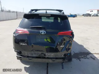 2016 Toyota RAV4 XLE with VIN 2T3WFREV9GW292772, listed as a IAAI auction lot 41727898 with 117,922 mi miles. Bid and sale history available at carsss.com. Image 16.