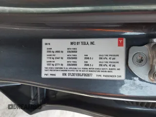 2018 Tesla Model 3 Long Range Battery with VIN 5YJ3E1EB5JF063077, listed as a IAAI auction lot 41773551 with 99,477 mi miles and . Bid and sale history available at DreamBid. Image 9.