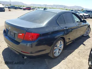 2011 BMW 5 Series 535i xDrive with VIN WBAFU7C55BDU55241, listed as a IAAI auction lot 42035748 with 169,154 mi miles. Bid and sale history available at carsss.com. Image 4.