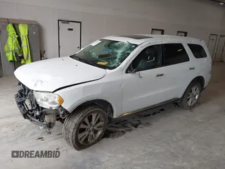 2013 Dodge Durango Crew z VIN 1C4SDJDT3DC540700, wystawiony jako IAAI lot #42097270 z przebiegiem 197 195 mil mil oraz . Historia ofert i sprzedaży dostępna na DreamBid. Obrazek 17.