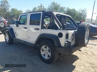 2007 Jeep Wrangler Unlimited X with VIN 1J4GB39147L133997, listed as a IAAI auction lot 41676009 with 110,849 mi miles and . Bid and sale history available at DreamBid. Image 3.