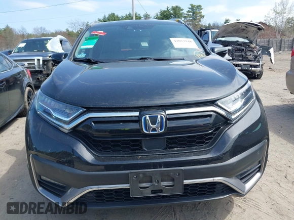 2020 Honda CR-V Touring with VIN 7FART6H96LE023782, listed as a IAAI auction lot 42053948 with 56,814 mi miles and . Bid and sale history available at DreamBid. Image 12.