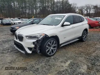 2017 BMW X1 xDrive28i with VIN WBXHT3C38H5F70088, listed as a Copart auction lot 50447715 with 119,649 mi miles and Clean Title. Bid and sale history available at carsss.com. Image 1.