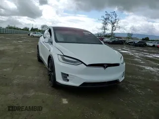 2016 Tesla Model X 70D with VIN 5YJXCAE28GF017100, listed as a Copart auction lot 50081235 with 126,962 mi miles and Salvage Title. Bid and sale history available at DreamBid. Image 11.