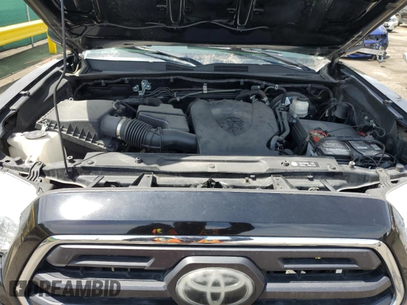 2019 Toyota Tacoma SR z VIN 3TMCZ5AN1KM253032, wystawiony jako Copart lot #52598445 z przebiegiem 69 489 mil mil oraz Szkoda całkowita • Salvage title. Historia ofert i sprzedaży dostępna na DreamBid. Obrazek 11.