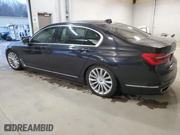 2017 BMW 7 Series 740i xDrive with VIN WBA7E4C53HGU99097, listed as a Copart auction lot 43945695 with 117,790 mi miles and Salvage Title. Bid and sale history available at carsss.com. Image 2.