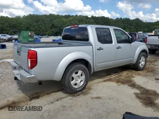 2007 Nissan Frontier Nismo with VIN 1N6AD07U27C422200, listed as a Copart auction lot 64451555 with 241,534 mi miles and Clean title. Bid and sale history available at DreamBid. Image 3.