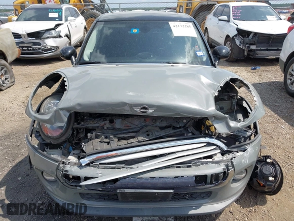 2015 MINI Hardtop 4 Door with VIN WMWXS5C56FT830418, listed as a IAAI auction lot 42132285 with 111,428 mi miles and . Bid and sale history available at DreamBid. Image 6.