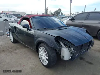 2001 Toyota MR2 Spyder with VIN JTDFR320710035330, listed as a IAAI auction lot 41238516 with 160,405 mi miles. Bid and sale history available at carsss.com. Image 1.