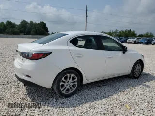 2016 Scion iA z VIN 3MYDLBZV2GY124307, wystawiony jako Copart lot #54020115 z przebiegiem 84 541 mil mil oraz Szkody całkowita. Historia ofert i sprzedaży dostępna na DreamBid. Obrazek 3.