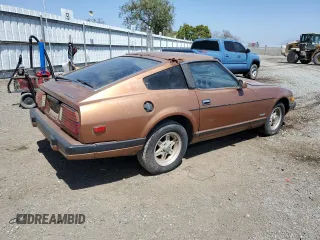 1982 Datsun 280ZX z VIN JN1HZ04S0CX433451, wystawiony jako Copart lot #53912864 z przebiegiem 200 629 mil mil oraz Tytuł czysty. Historia ofert i sprzedaży dostępna na DreamBid. Obrazek 3.