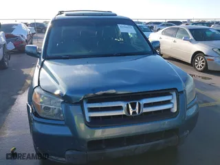 2007 Honda Pilot EX-L with VIN 5FNYF285X7B045780, listed as a IAAI auction lot 41324224 with 168,911 mi miles. Bid and sale history available at carsss.com. Image 6.